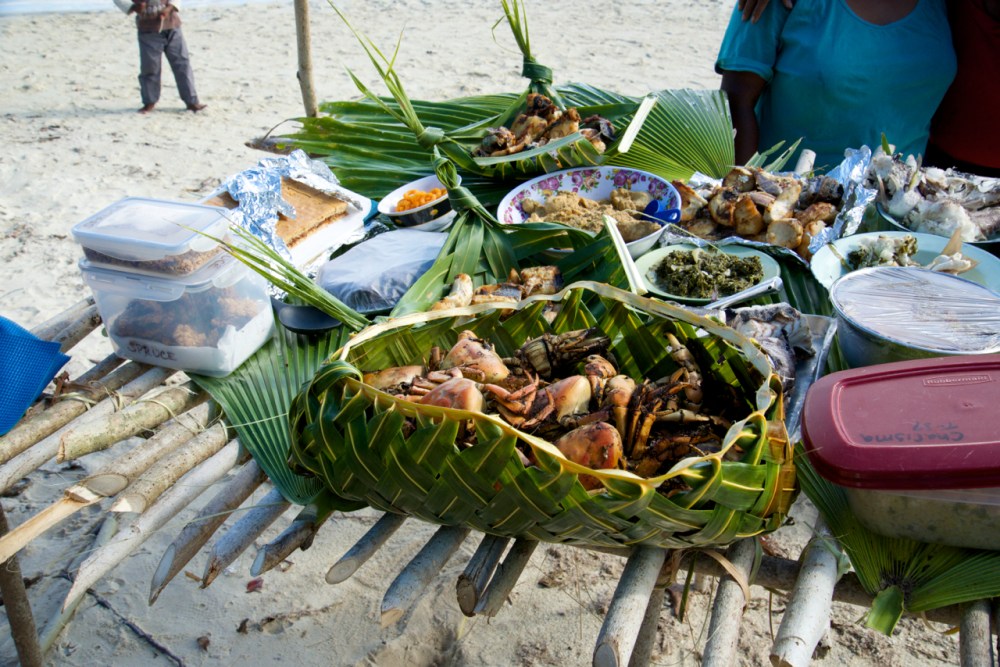 Cooked crabs served in a basket.