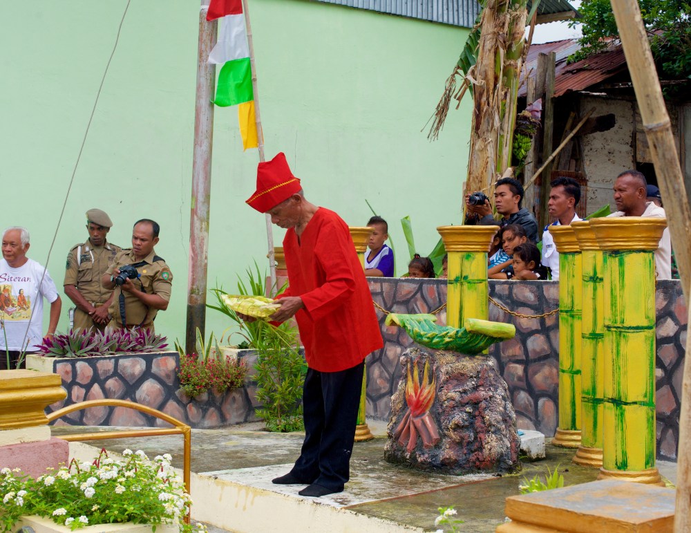The Village Elder blesses our boats during a solemn ceremony.
